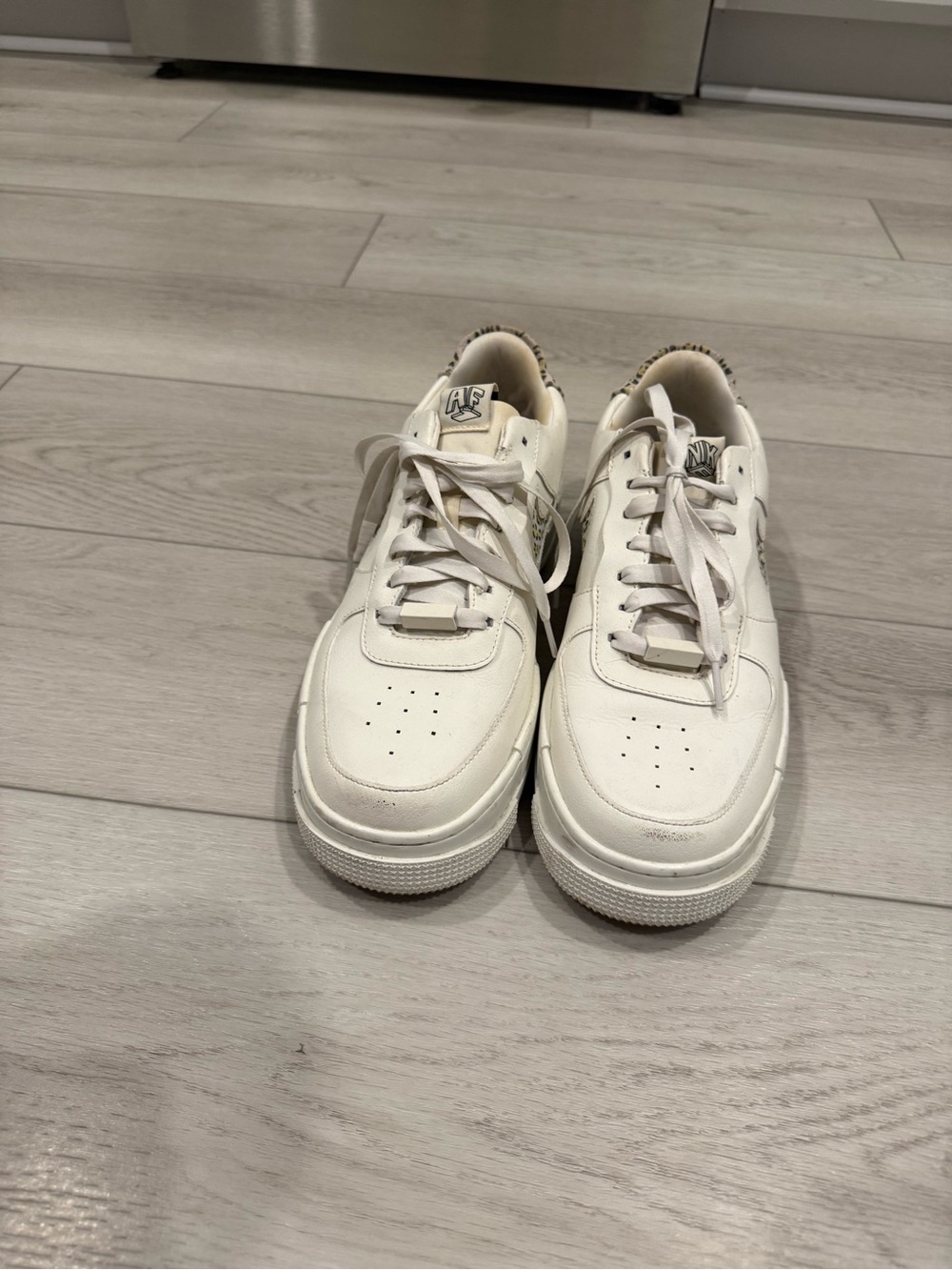 Nike White Leather Low-Top Sneakers with Cheetah Accents